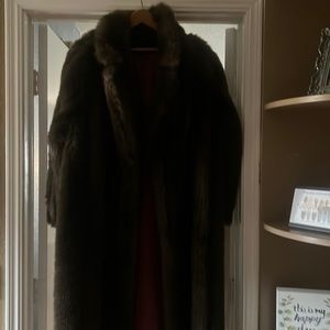 A beautiful mink coat.  Pictures don’t do it justice.  Asking $880 OBO.